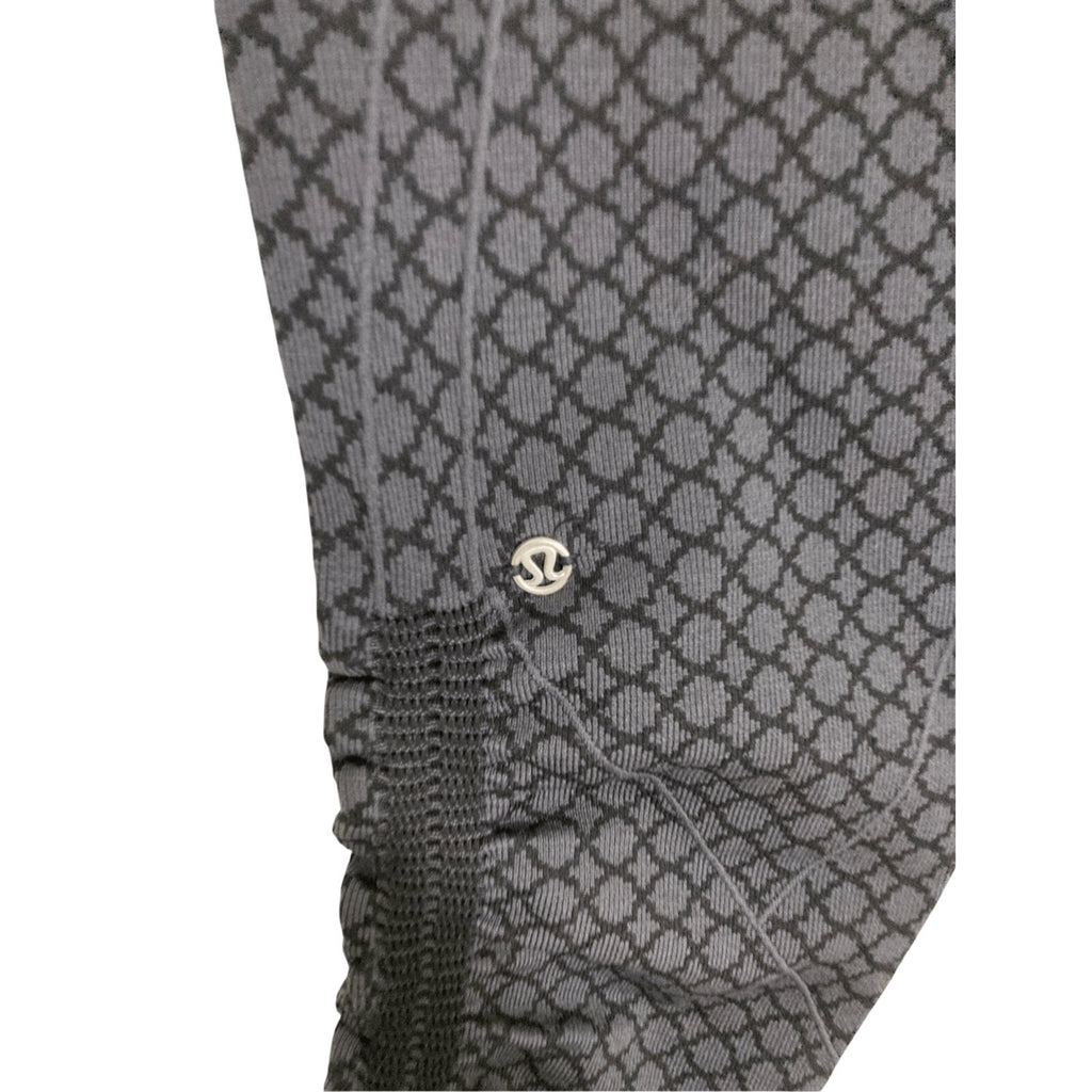 Lululemon Printed SZ 4 Novelty Black Compression Capri Pedal Pusher Leggings